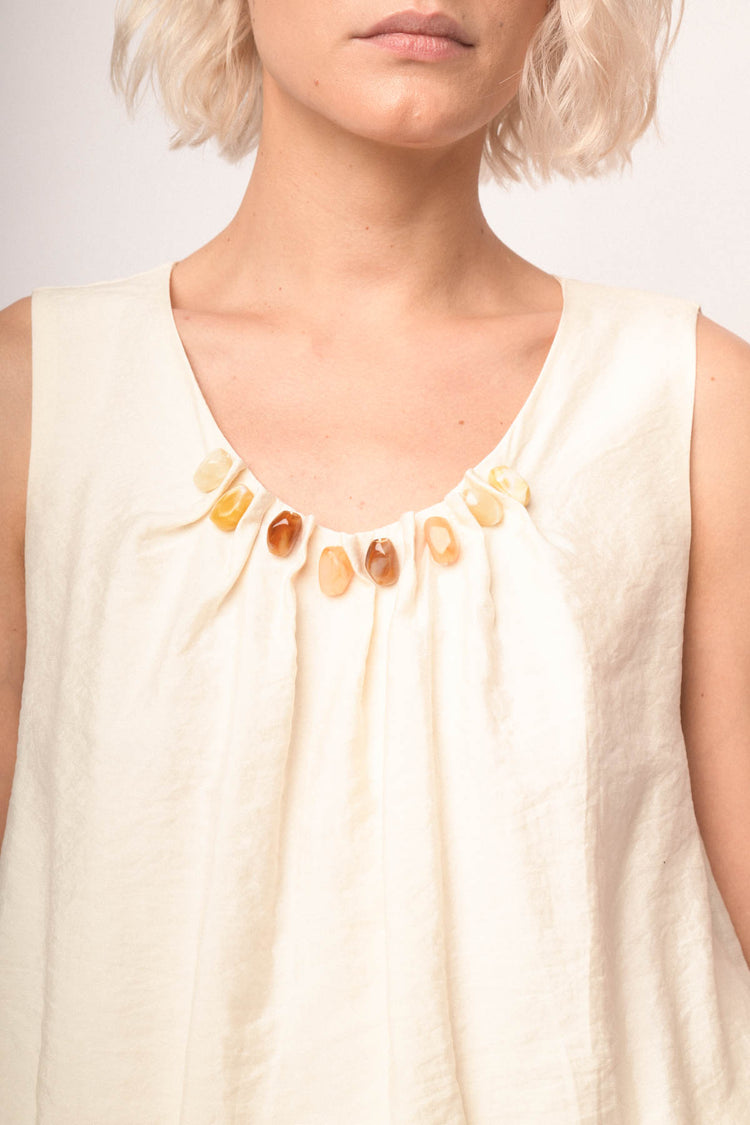 Top avorio con pietre decorative multicolor