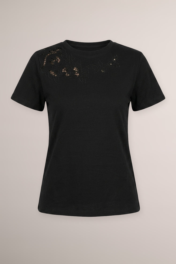 T-shirt nera con ricamo floreale