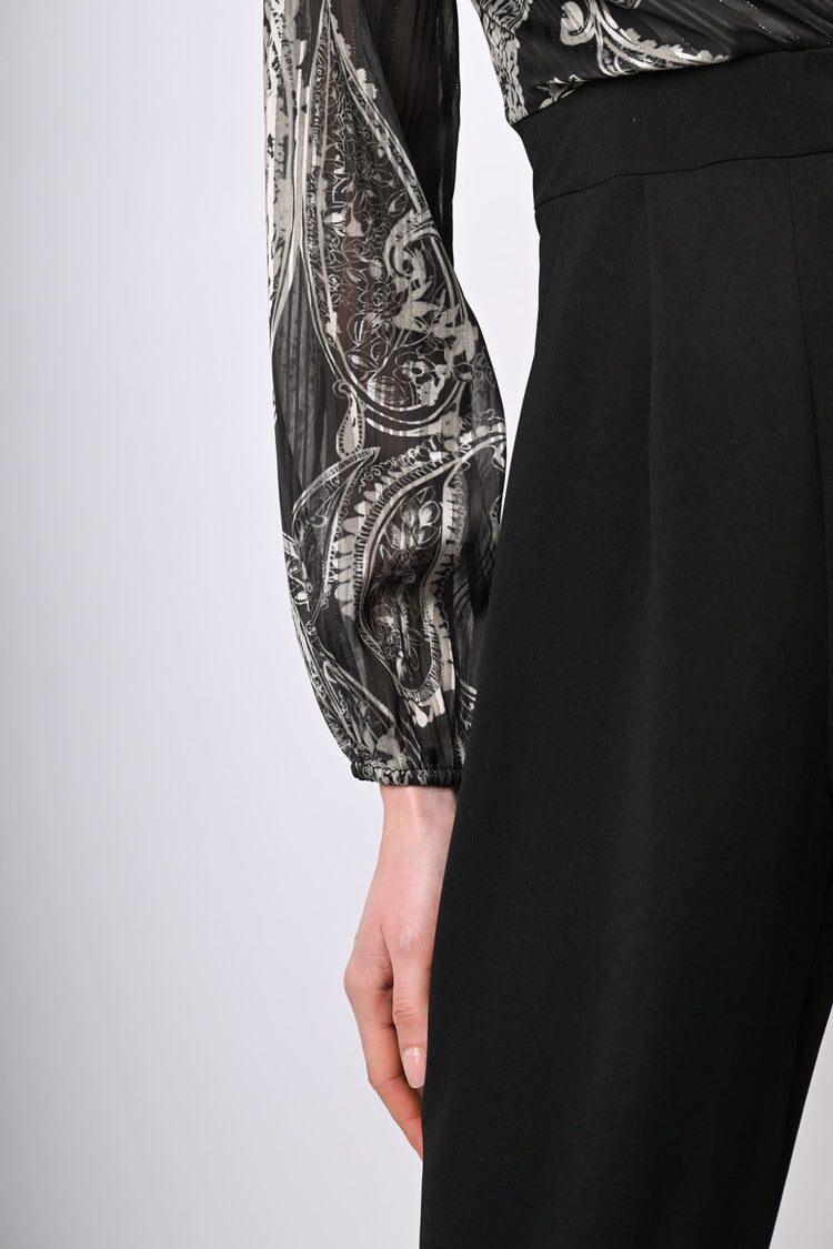 Tuta bi-materiale con stampa paisley