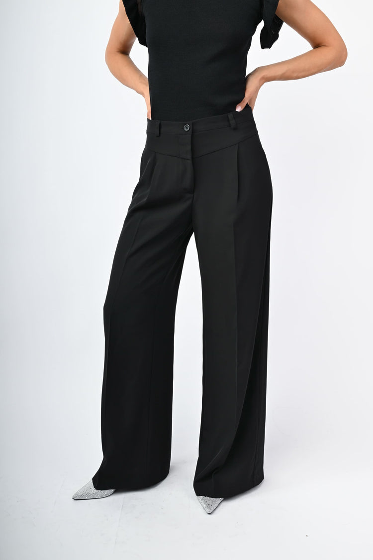 Pantaloni palazzo con baschina