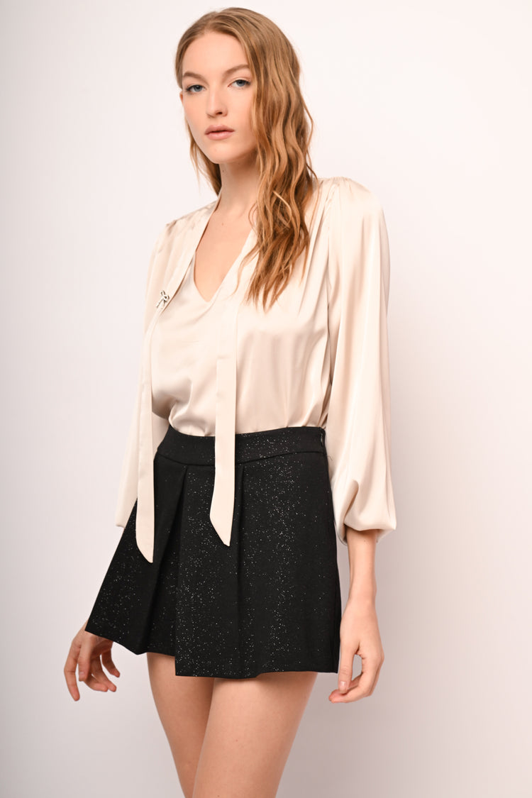 Skort con pieghe e glitter