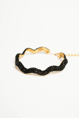 Collana ondulata e rigida con perline nere