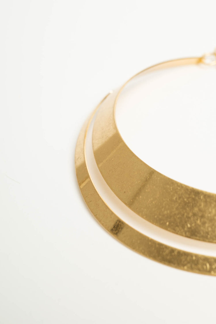 Collana rigida in metallo dorato