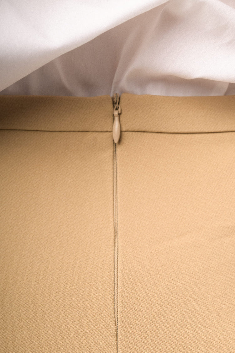 Pantaloni palazzo con piega stirata beige