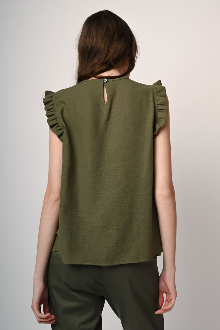 Top con rouches e cut-out