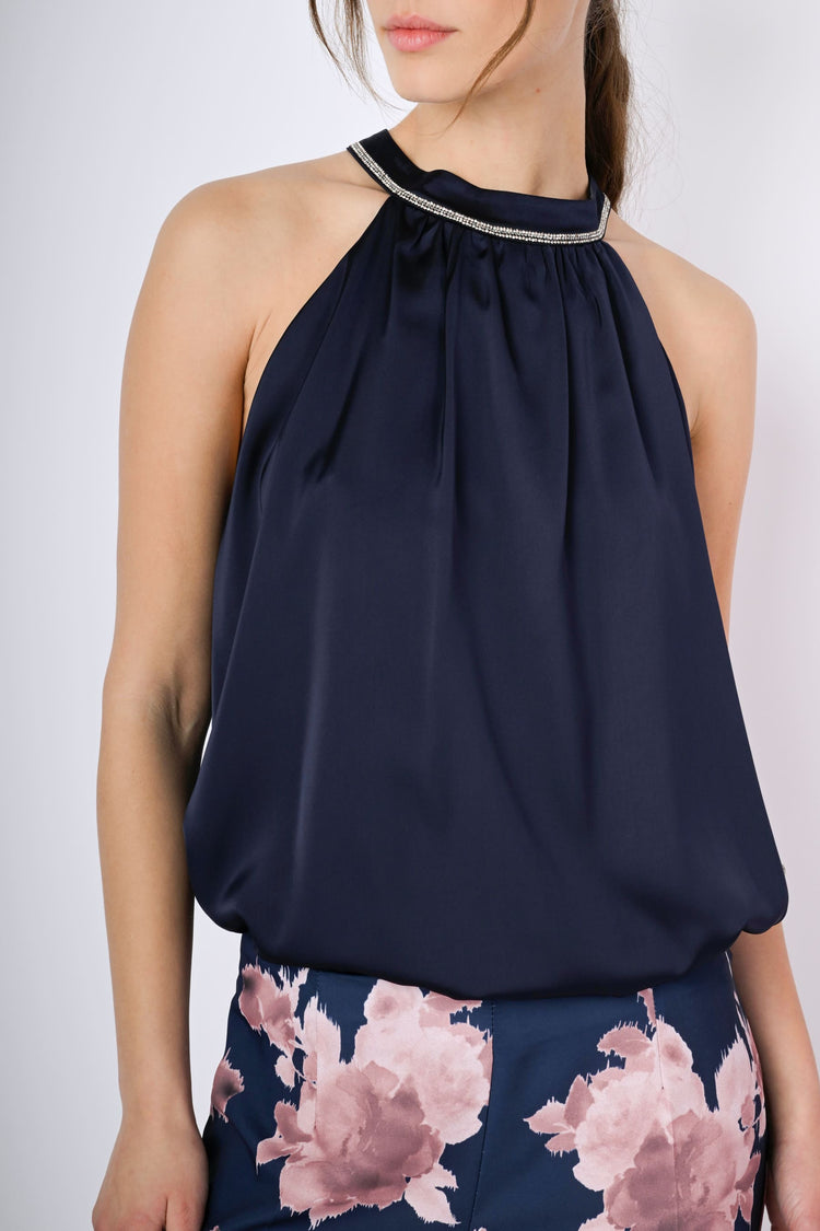 Top con decorazione strass