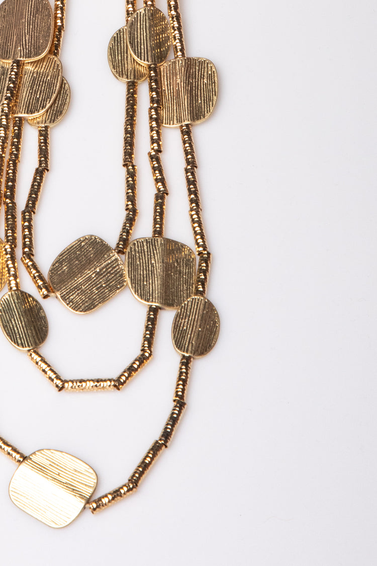Collana multifili con piastre