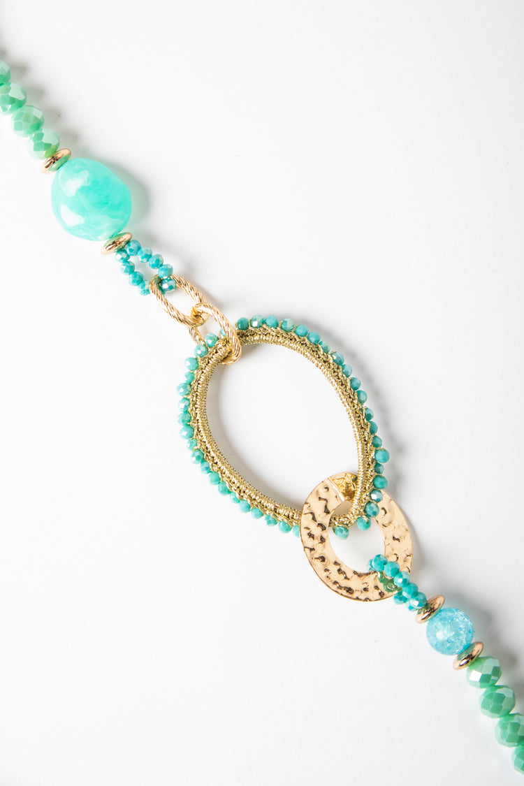 Collana lunga con cerchi e perline