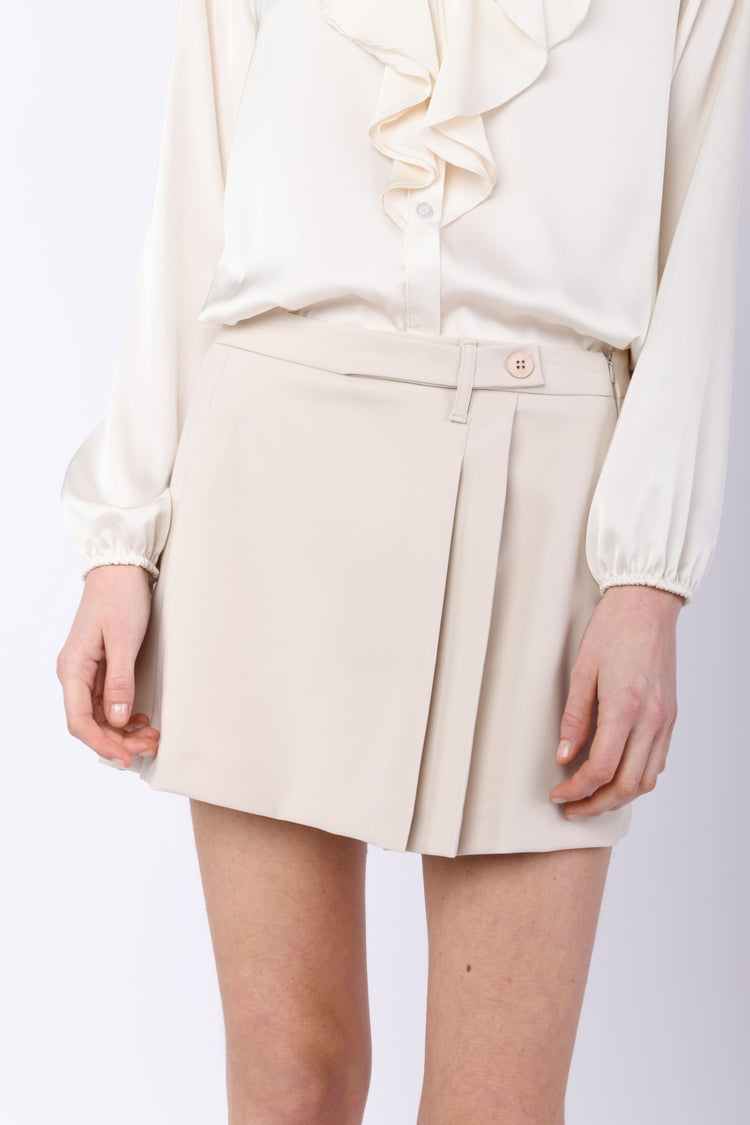 Skort con pieghe