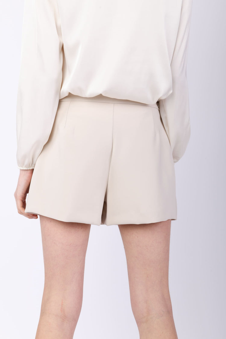 Skort con pieghe