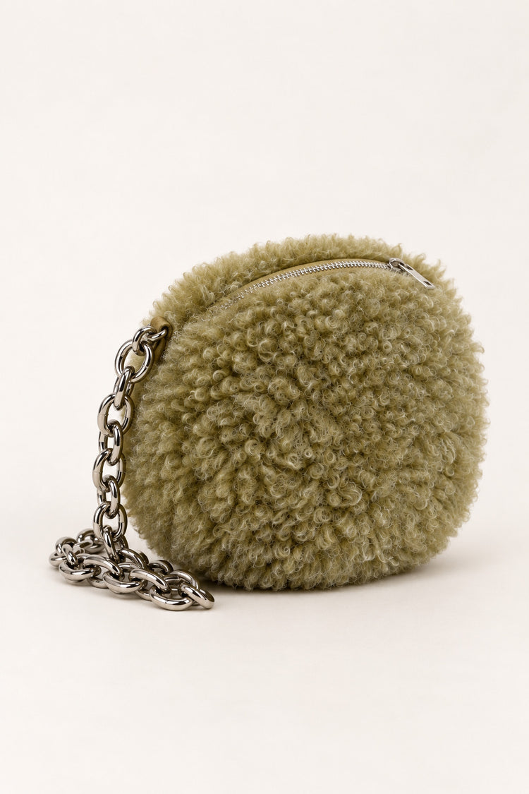 Pochette in faux shearling verde