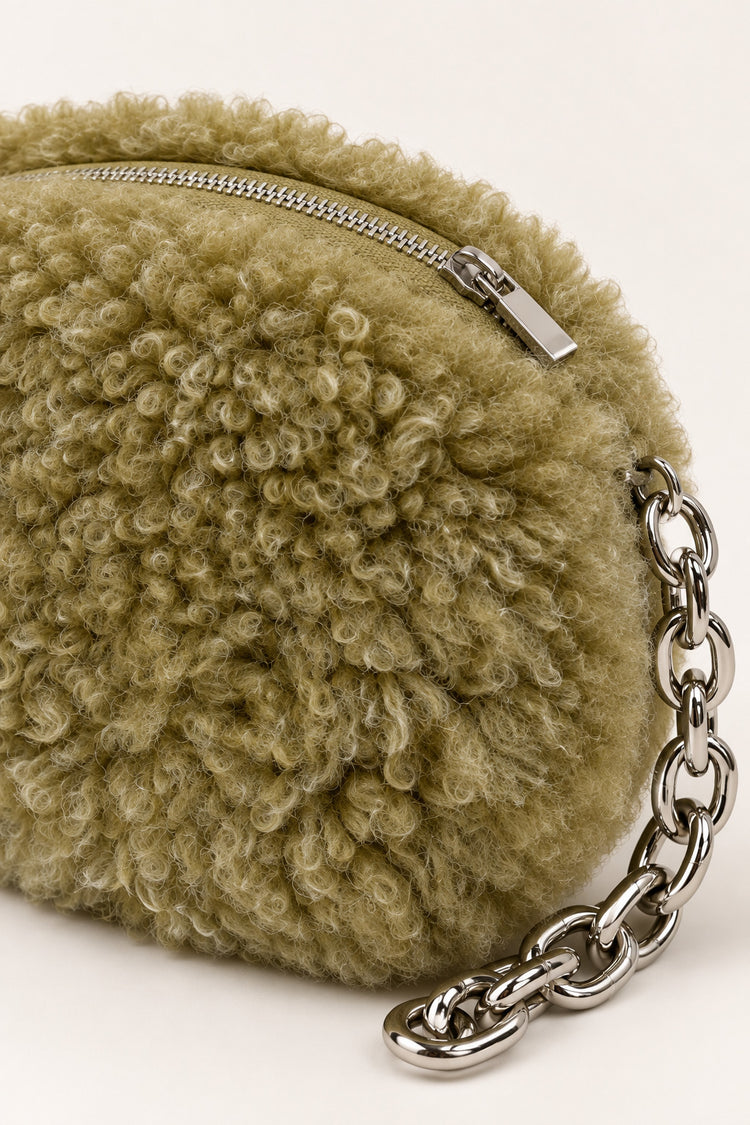 Pochette in faux shearling verde