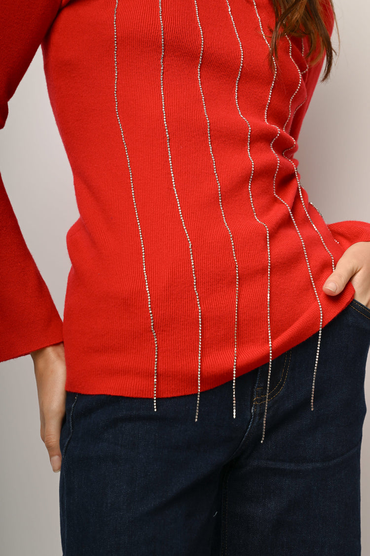 Pull con fili pendenti in strass