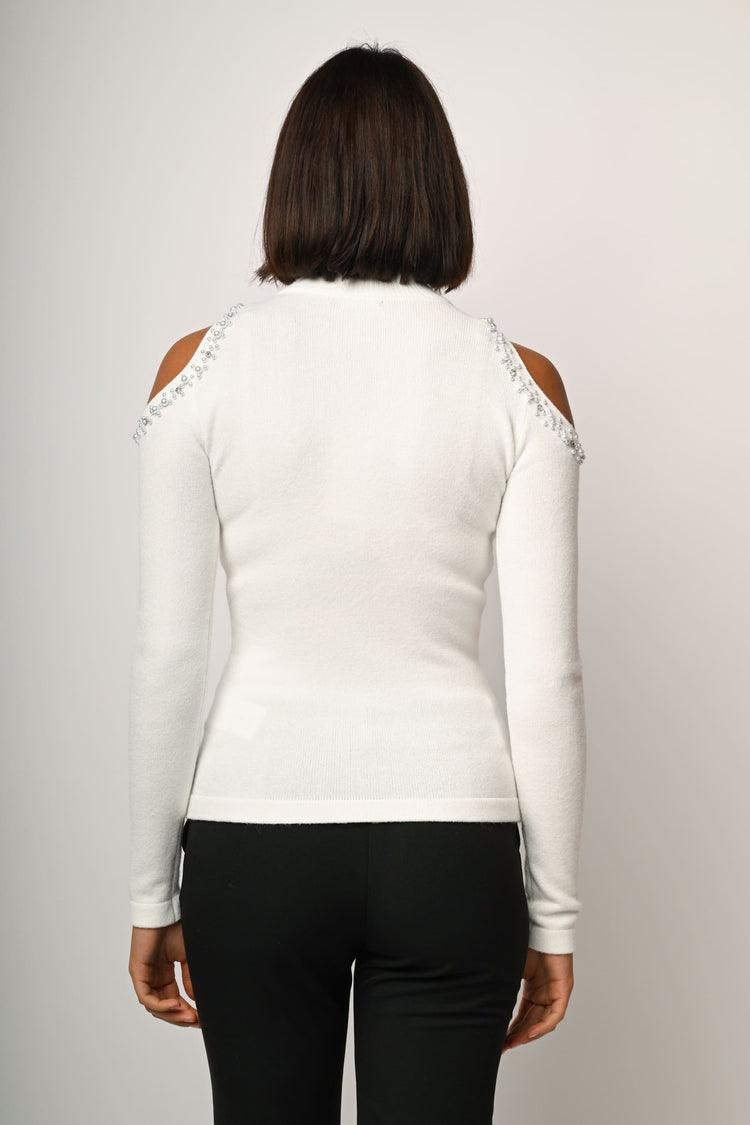 Lupetto con cut-outs e perline