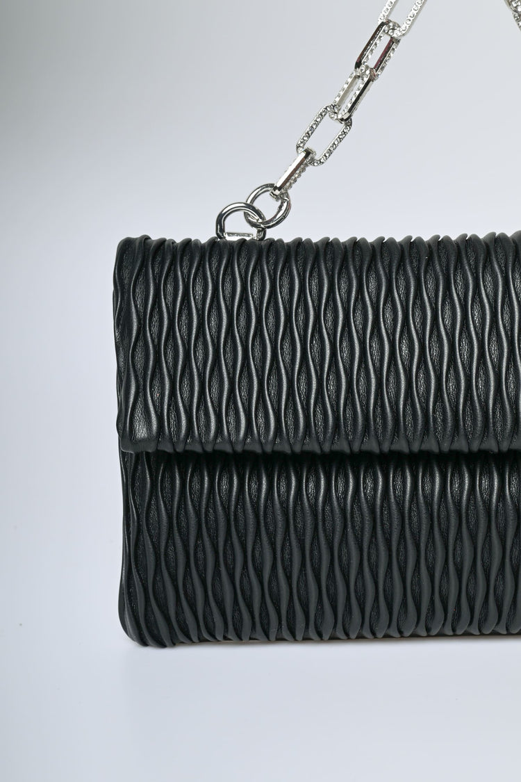 Pochette goffrata con manico gioiello