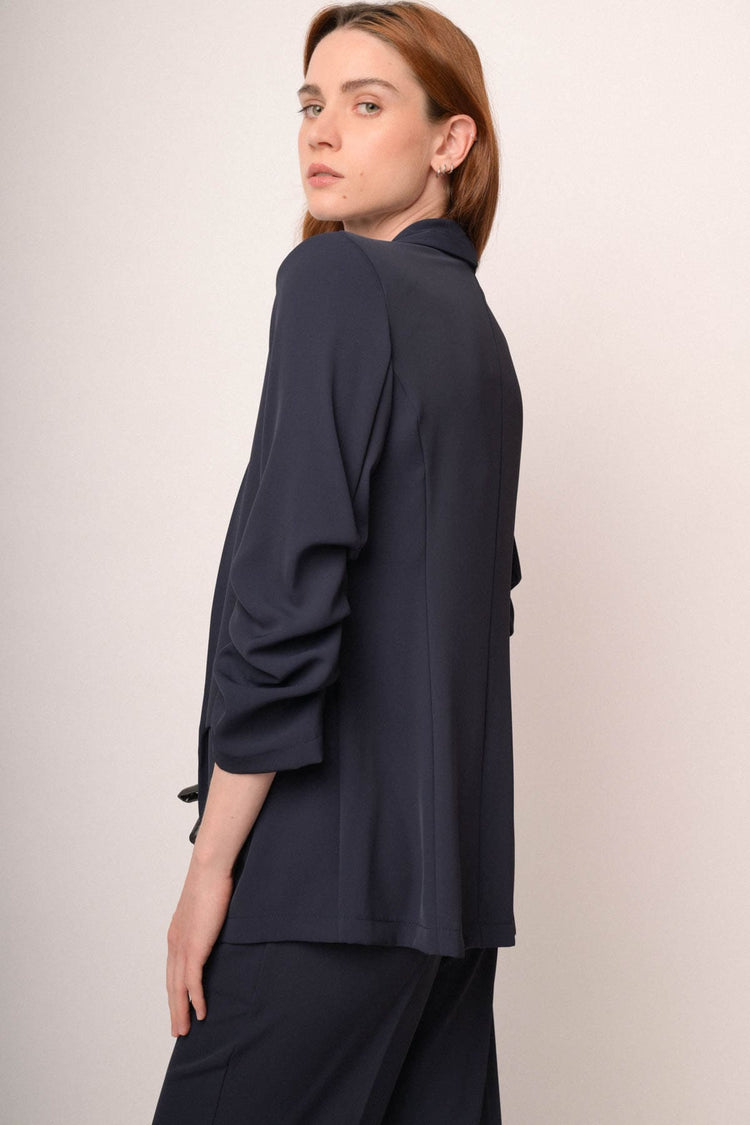 Giacca blu con maniche arricciate